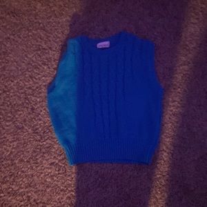 turquoise vest size small but they run big, from garland made in usa